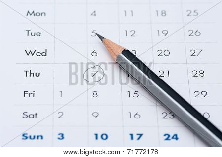 Gray Pencil On A Open Calendar Business Agenda