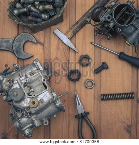 Carburetors for a car engine with tools
