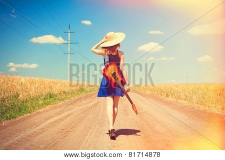 Rock Girl With Guitar At Countryside.