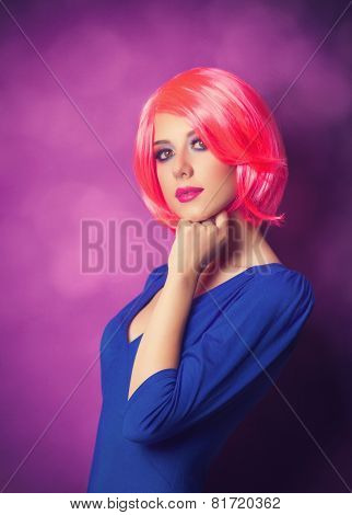 Portrait Of A Young Girl On Purple Background