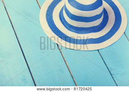 Blue Hat Wooden Table.
