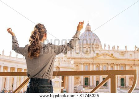 Young Woman Rejoicing In Front Of Basilica Di San Pietro In Vatican City State