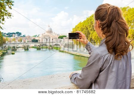 Young Woman Taking Photo While On Bridge Ponte Umberto I With Vi