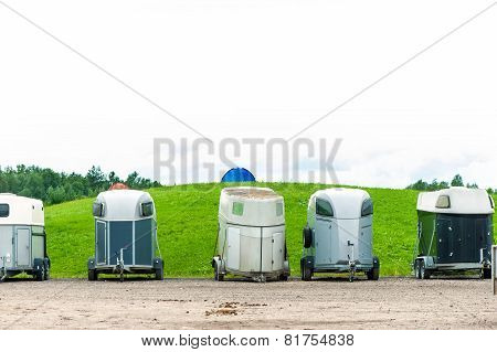 Many Horse Trailers In The Green Park Outdoors.