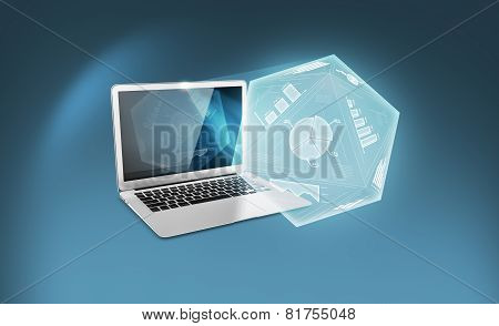 Laptop with charts and graphs