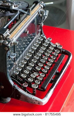 Old Retro Black Metallic Typewriter With Antique Round  Keys.