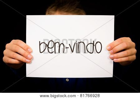 Child Holding Sign With Portuguese Word Bem-vindo - Welcome