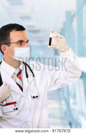 Doctor  Resarch A Medical Test Glass With Blood.