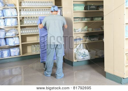 Medical staff sterilizing hands and arms before surgery
