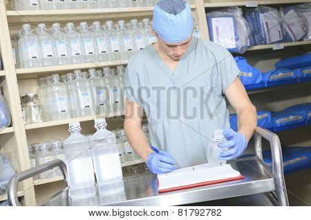Medical staff sterilizing hands and arms before surgery
