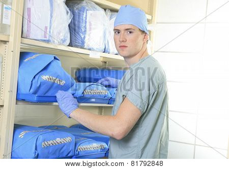 Medical staff sterilizing hands and arms before surgery