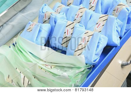 Medical staff sterilizing hands and arms before surgery