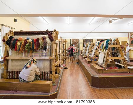 The Woman Behind Work - Weaving A Carpet Of Silk