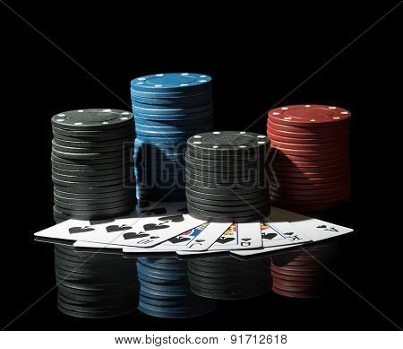Colorful poker chips with cards