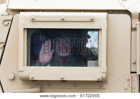 Hmmwv Military Vehicle With Soldier Looking Out The Window
