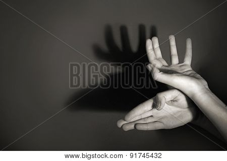 Hands gesture like deer on gray background