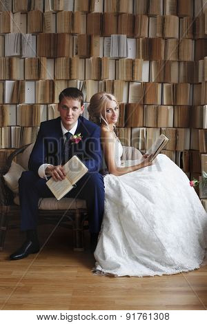 The Bride And Groom On The Wicker Furniture