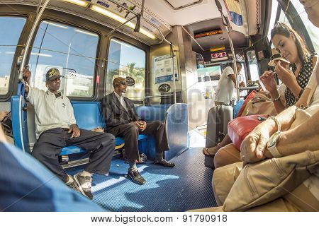 People In The Downtown Metro Bus In Miami, Usa
