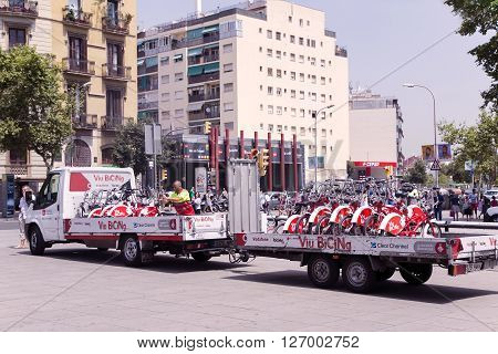 SPAIN, BARCELONA, JUNE, 27, 2015 - Truck transports Bicing city bikes in Barcelona, Catalonia, Spain. Bicycles are a large and important part of Barcelona's public transport system.
