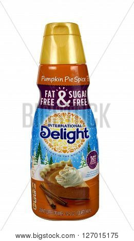 RIVER FALLS,WISCONSIN-APRIL 24,2016: A container of International Delight brand Pumpkin Pie Spice coffee creamer.