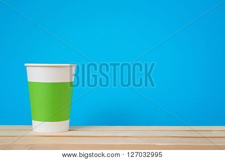Paper cup with Sleeve on blue background