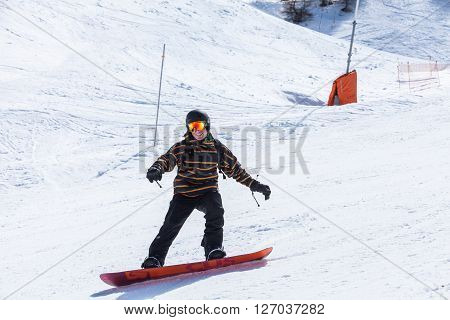 View of a snowboard model in the ski resort Les Orres in France