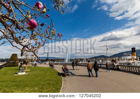GENEVA, SWITZERLAND - APRIL 11, 2015: Exterior views of the buildings and fountain at the Geneva Lake on April 11 2015. Its the second most populous city in Switzerland (after Zurich).