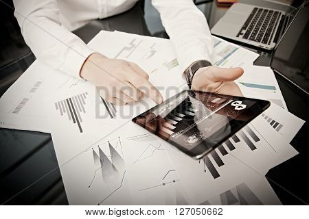 Investment manager working process.Photo trader work market report modern tablet.New business project startup.Horizontal