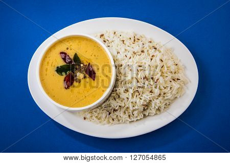 Whole Yellow Lentil with Rice, dal tadka and jeera rice, Indian Dish, cooked rice and cooked Arhar or Toor dal (Pigeon Pea)
** Note: Visible grain at 100%, best at smaller sizes