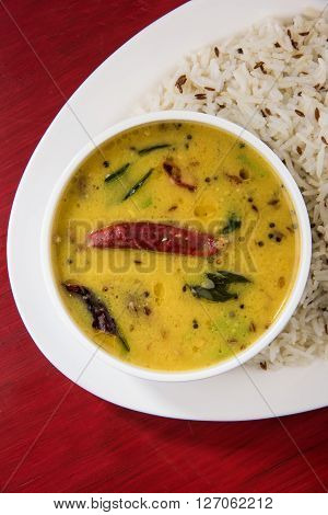 Whole Yellow Lentil with Rice, dal tadka and jeera rice, Indian Dish, cooked rice and cooked Arhar or Toor dal (Pigeon Pea)