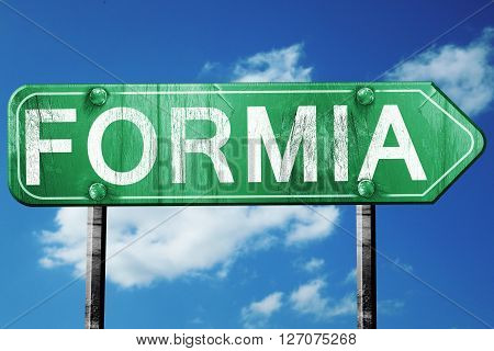 Formia road sign, on a blue sky background