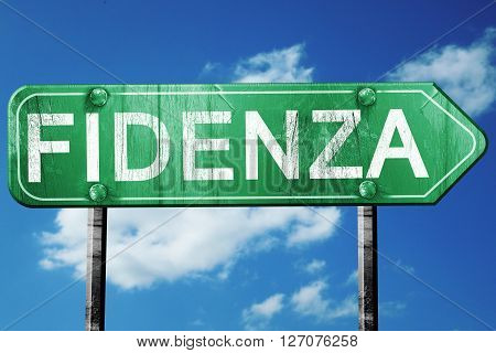 Fidenza road sign, on a blue sky background