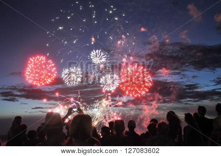 Fireworks display and spectators in silhouette at the night time Australia Day celebration on January 26,2016 in Fremantle, Western Australia.