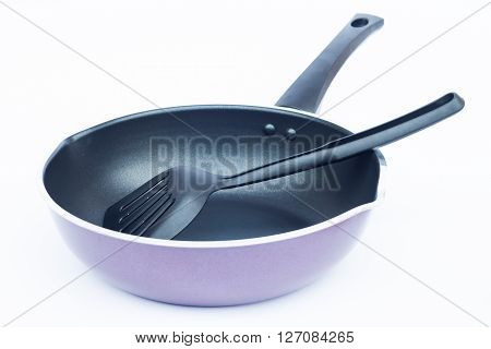 Non stick frying pan on white background, stock photo