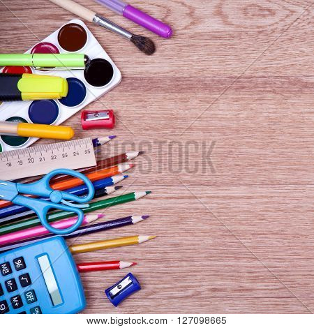 A lot of bright new items for creativity on a wooden table