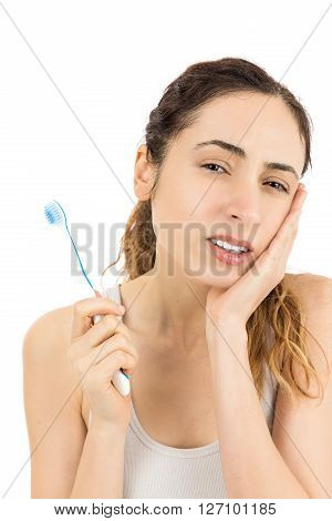 Woman having tooth ache. Isolated on white background.