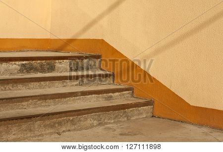 Old Stairway And Orange Wall.