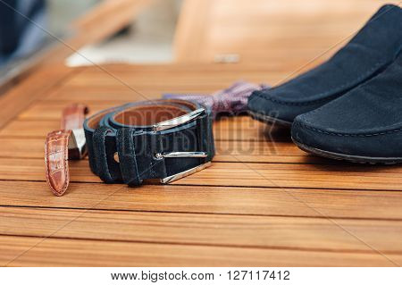 Set of groom clothes. Wedding rings shoes cufflinks and bow tie detalis fashion