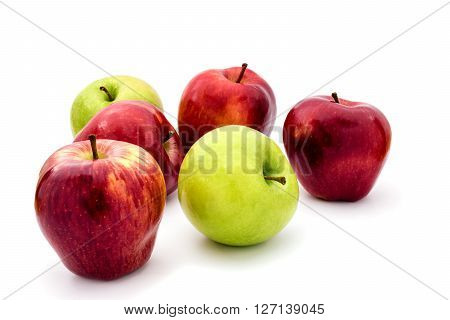 Green and red apples isolated on white background