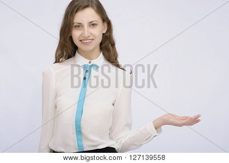 Portrait of businesswoman palms up on isolated background