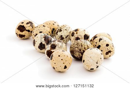 Quail eggs isolated on the white background