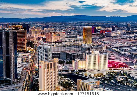LAS VEGAS, NEVADA - SEPTEMBER 9, 2015: View of Las Vegas and the Las Vegas Strip from above on sunset on September 9 2015. Las Vegas is known primarily for gambling shopping and fine dining.