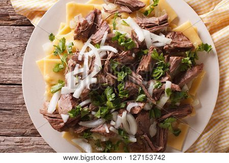 Asian Food: Beshbarmak Close-up On A Plate. Horizontal Top View