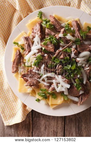 Asian Beshbarmak - Noodles With Lamb And Onion Close-up. Vertical Top View