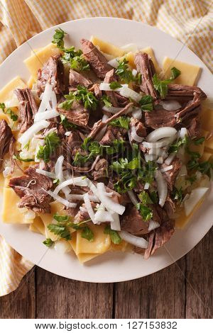 Asian Food: Beshbarmak Close-up On A Plate. Vertical Top View