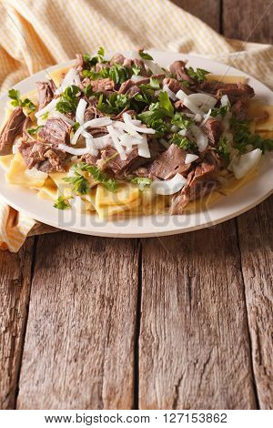 Asian Food: Beshbarmak Close-up On A Plate. Vertical