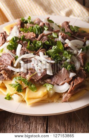 Asian Beshbarmak - Noodles With Lamb And Onion Close-up. Vertical