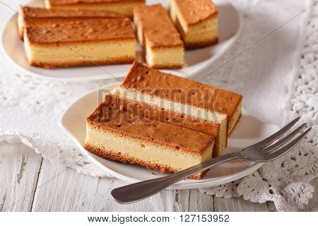Tasty Japanese Cake Kasutera Close-up On The Table. Horizontal