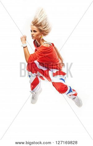 Beautiful girl in a crazy jumpin a red sports hip-hop clothing