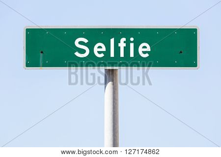 Street name sign with the word Selfie